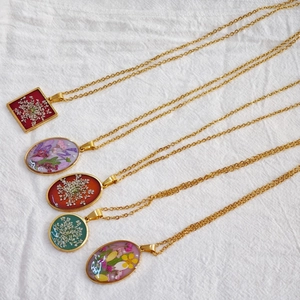Handmade stainless steel necklaces with real dried flowers in assorted resin charms