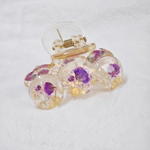Handmade clear resin shark hair clip with real purple dried flowers and gold glitter flakes