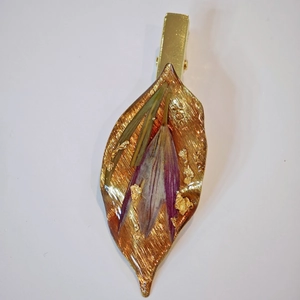 Handmade leaf hair clip with purple dried flowers and gold leaf in resin