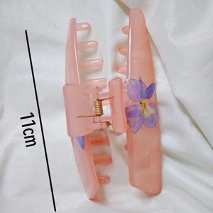 Handmade purple bird floral hair claw clip in translucent pink resin 11cm