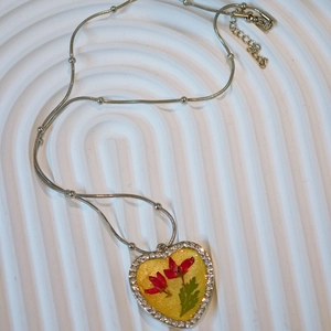 Sparkling silver heart necklace with red dried flowers and crystal rhinestones