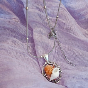 Handmade seashell pendant necklace with silver chain and vintage bohemian marine style