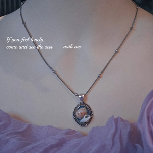 Handmade shell conch pendant necklace with vintage stainless steel bead chain on a bust