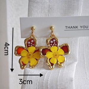 Handmade gold flower earrings with red glaze and white pearls, sized 4cm by 3cm