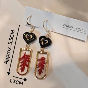 Handmade red dried flower earrings with black heart and gold frame in 5.5cm length