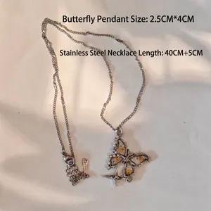 Schmetterling Halskette aus Edelstahl mit getrockneten Blumen, 2,5x4cm Anhänger, 45cm Kette