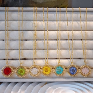 Handmade necklace set with real dried flowers in gold openwork circular pendants