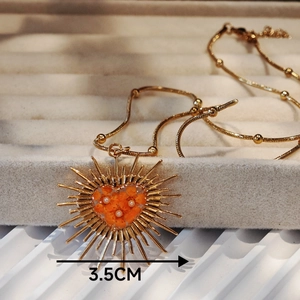 Handmade heart-shaped stainless steel necklace with orange dried flowers and pearls, 3.5cm