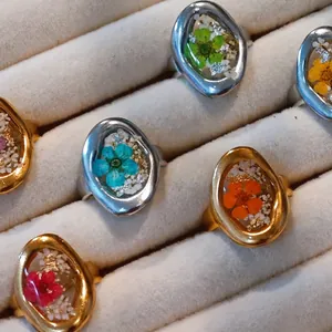 Handmade stainless steel open ring with real preserved flowers in resin