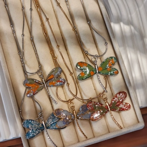 Handmade dragonfly necklaces with real dried flowers in stainless steel finish