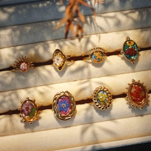 Handmade stainless steel open rings set featuring colorful real dried flowers and shells