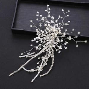 Luxurious bridal hair comb with handmade pearl flowers and sparkling rhinestone tassels