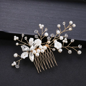 Elegant bridal hair comb with gold wire, white pearls and floral crystals for wedding hair