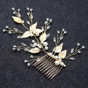 Golden leaf hair comb with white pearls and crystals for wedding hairstyles