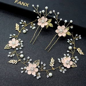 Floral bridal hair vine set with pink flowers, pearls and gold leaves on black background