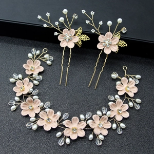 Handmade flower hair accessory set with pink blossoms, pearls and gold leaves