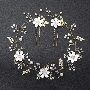 Exquisite bridal floral hair vine and U-shaped pins set with white flowers and pearls
