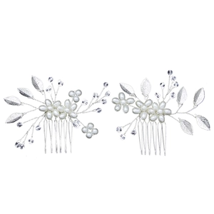 Detail of silver bridal hair combs featuring white pearls, crystals, and alloy leaf accents