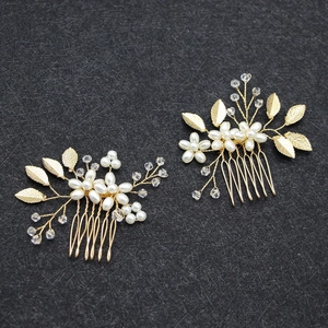 Set of two gold leaf bridal hair combs with white pearls and clear beads for weddings