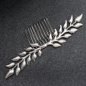 Elegant silver willow branch hair comb featuring detailed leaf veins on a black base
