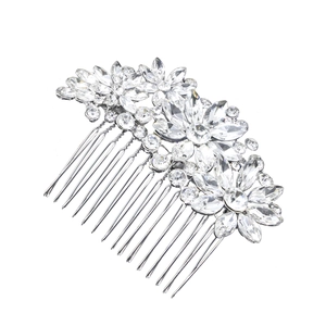 Elegant bridal hair comb with silver flower patterns and crystal rhinestones on white background
