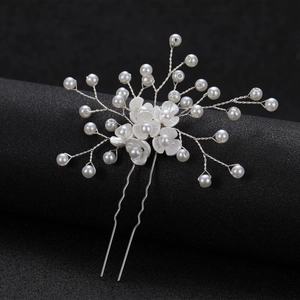 Handmade bridal hair pin with white shell flowers and pearls on silver twist wire