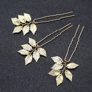 Set of three golden leaf U-shaped hair pins for bridal wedding hair accessories