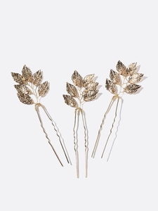 Set of three golden leaf hair pins for bridal wedding hairstyles and formal bun updos