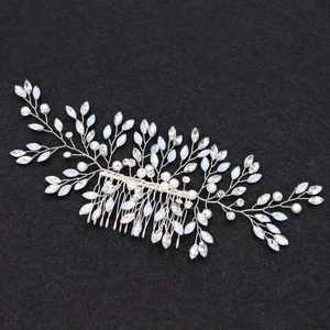 Silver bridal hair comb with blue crystal rhinestones and white pearls in leaf design