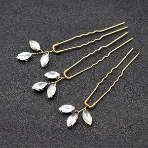 3-piece set of golden bridal hair pins with marquise crystal leaf designs for weddings
