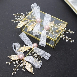 Bridal hair accessory set with white lace, pink pearls, and gold leaves for wedding styles