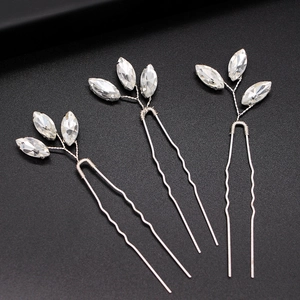 Three-piece bridal hair pin set with marquise crystals and silver leaf design