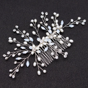 Handmade bridal hair comb with pearls, crystals, and opal stones for wedding hairstyles