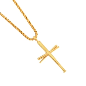 Macro shot of gold baseball bat cross pendant with polished box chain necklace
