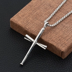 Detail of silver stainless steel baseball bat cross pendant with box chain on leather