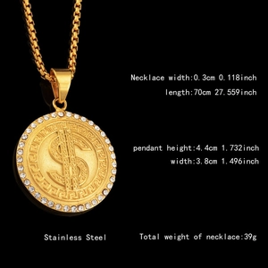 Polished gold stainless steel necklace featuring a dollar sign pendant with white rhinestones