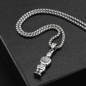 Close-up of hip-hop terracotta warrior pendant in polished steel on black leather