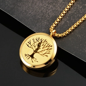 Golden Tree of Life necklace with round hollow pendant on elegant round box chain
