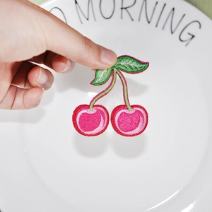 Realistic embroidered cherry patch for DIY clothing accessories with red and green thread
