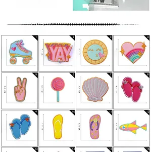 Macro detail of 12 cartoon embroidery patches including rainbow and shell with dimensions