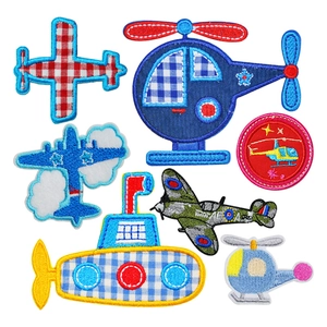 Set of 7 colorful embroidered transportation patches including airplanes and helicopters