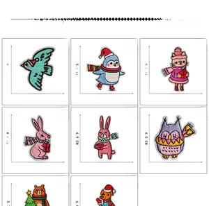 Detail view of colorful embroidered Christmas animal patches with dimensions