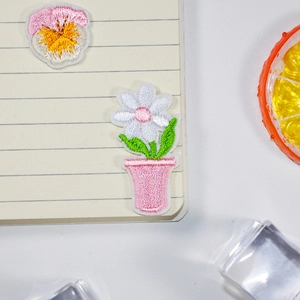 Detailed pansy and daisy floral embroidery patches for DIY clothing decoration