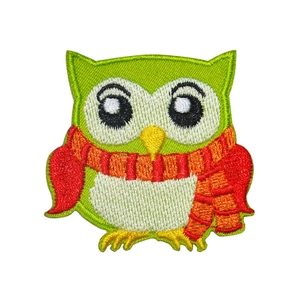 Cartoon owl embroidery patch in bright green with orange scarf on white background