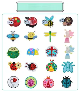 Macro detail of 20 assorted insect embroidery patches showing fine colorful stitching