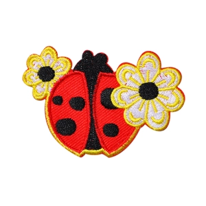 Vibrant red ladybug and flower embroidery patch with detailed yellow stitched borders