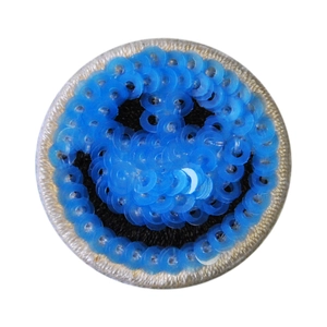 Blue sequin smiley face patch with white stitched border for DIY clothing accessories