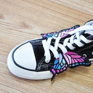 Black high-top canvas shoes with colorful embroidered butterfly wings decoration