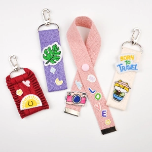 Handmade colorful cotton canvas luggage tags with embroidered patches and metal lobster clasps
