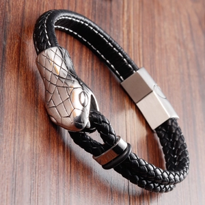 Men's double-layered black woven leather bracelet featuring a silver snake head magnetic clasp